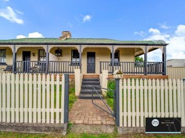 Two bedroom cottage style unit with lots of character!