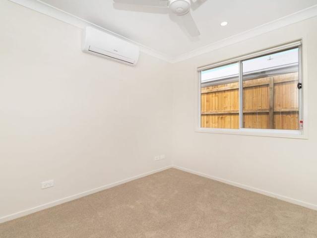 Two Bedroom Duplex With a Fully Fenced Backyard