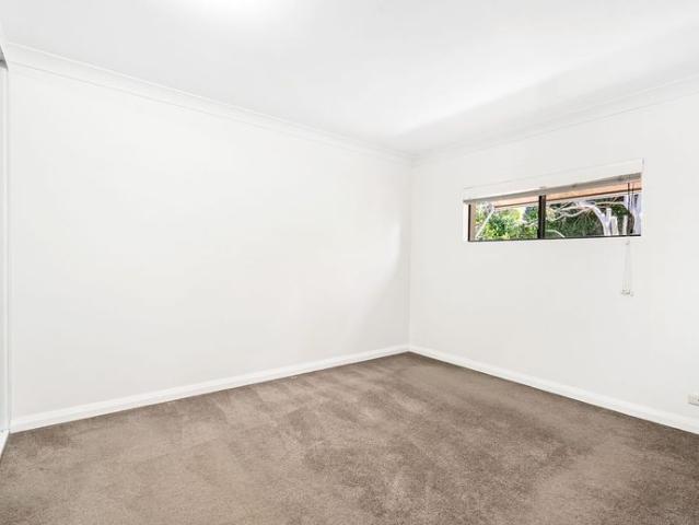 Two Bedroom Home with Spacious Yard and Double Garage