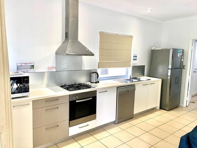 Two bedroom house in resort setting opposite Woodgate Beach