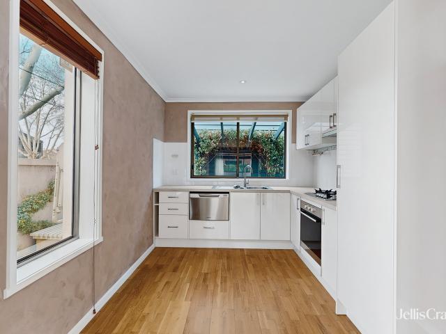 Two bedroom Kensington apartment with secure car space, steps from Kensington Station