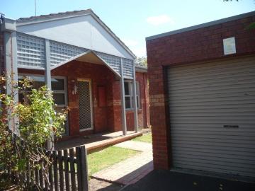 Two bedroom single story unit a short walk to Woolworths Newtown Supermarket