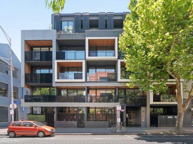 Two bedrooms, two balconies, two car spaces A rare Carlton offering