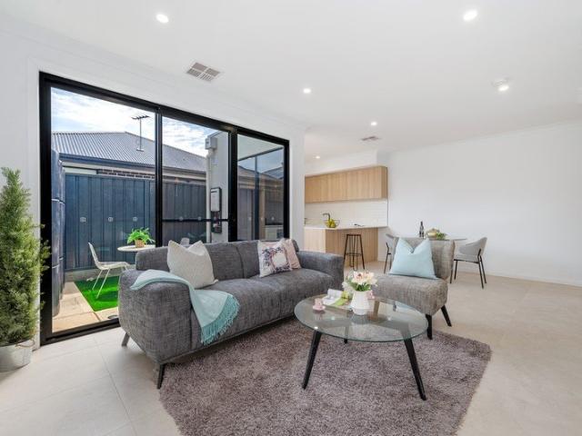 Two Brand New Townhouses Offering Modern Style & Convenience!