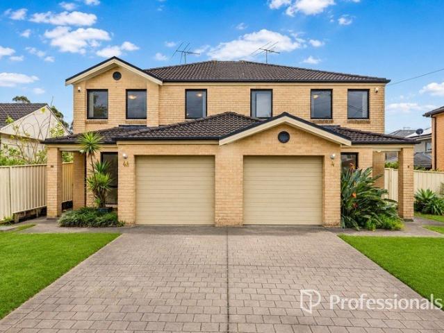 Two Duplexes on One Title! An Exceptional Opportunity