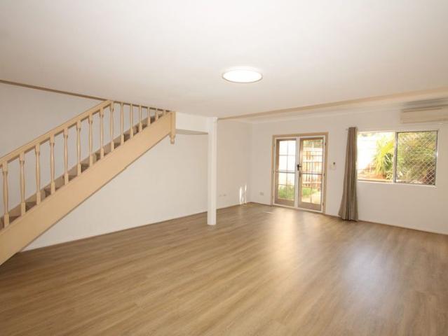 Two Ensuite Bedrooms, Balcony and Private Yard!