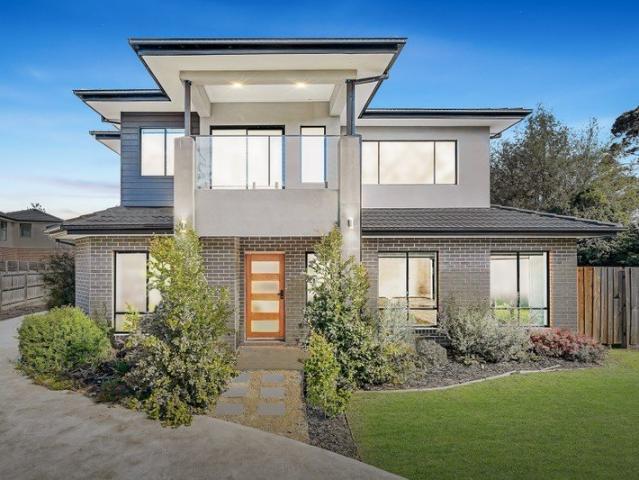 Two exceptional, independent townhouses with space, style and large backyards