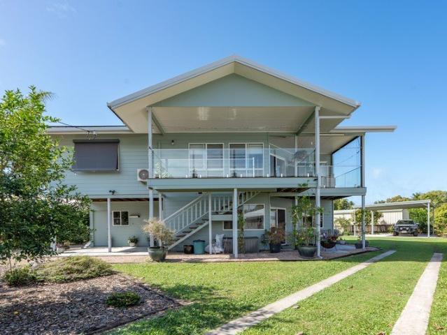 Two Homes in One! Tropical Resort Living, Solar Power & Massive High Clearance Carport