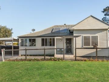 Two Homes. One Address. A Rare Opportunity to Flex, Invest or Grow