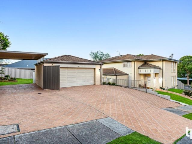 Two Homes, One Address Six Bedrooms, Three Bathrooms, and a Private Retreat