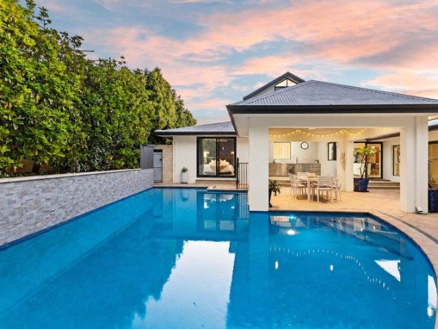 TWO HOMES. ONE ROOF. ONE EXCEPTIONAL COASTAL POSITION