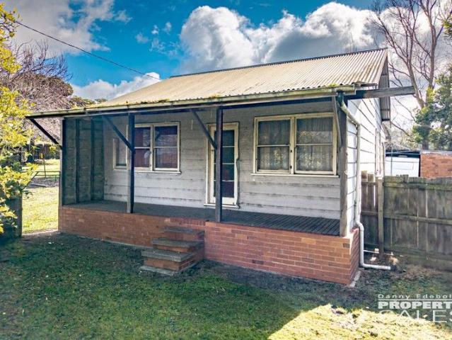 Two Homes Sold as One!