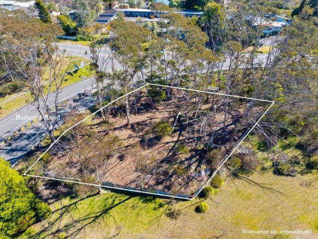 Two Lots, Single Title. Near Level. Close to Town