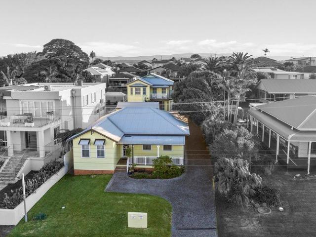 Two large homes on one title approx. 200m to beach