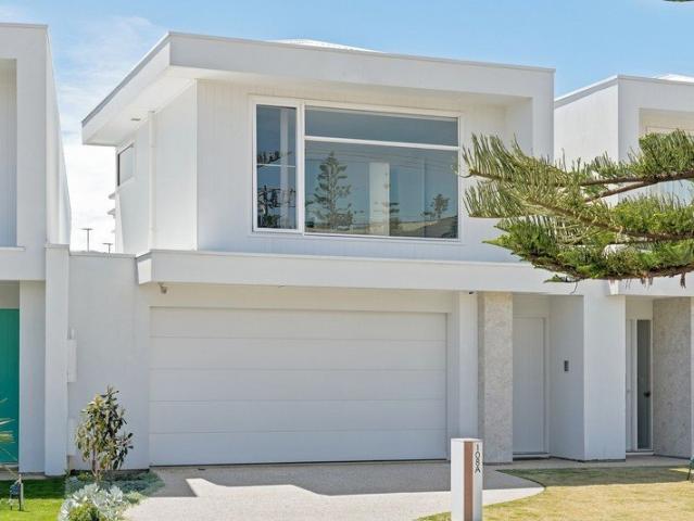 Two Levels Of Style, One Brilliant Beachside Address