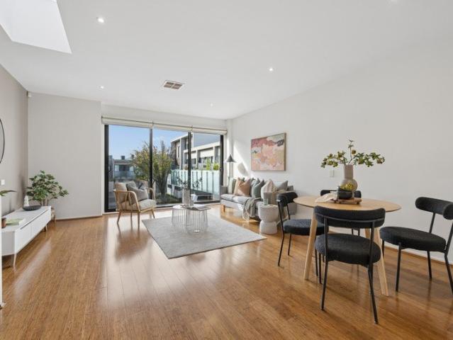 Two Levels of Style, Elevated by a Private Rooftop