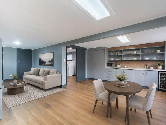 TWO LEVELS, ENDLESS POSSIBILITIES, A RARE DUAL LIVING OPPORTUNITY IN SUN VALLEY