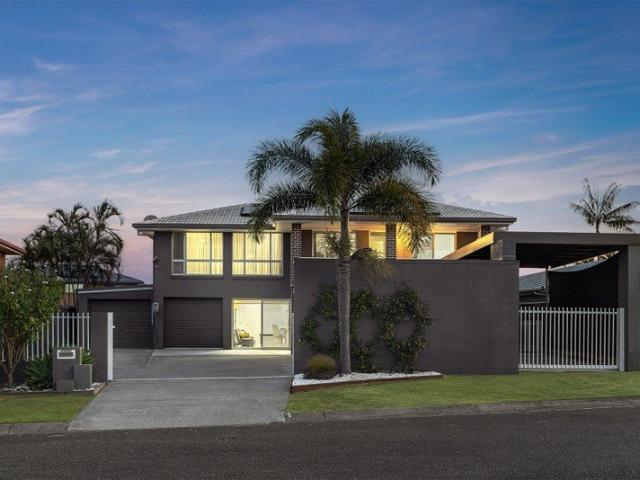 Two Levels. Two Kitchens. One Exceptional Family Home