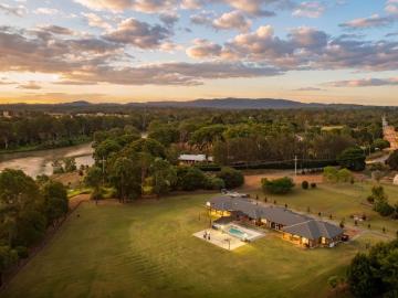 Two Luxury Homes Under One Roof on 2.5 Riverside Acres