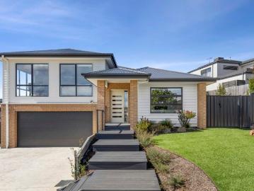 Two Master Suites, Multiple Living Zones & Elevated Family Appeal
