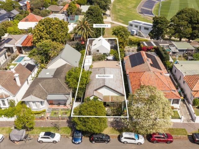 Two seperate freestanding residences on a level 487sqm freehold block