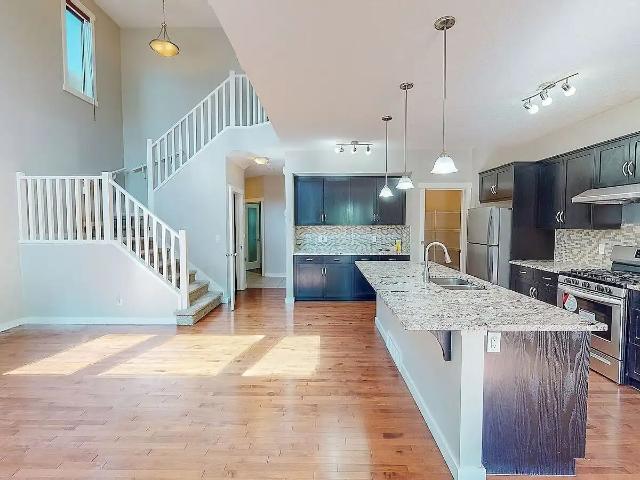 Two Storey Home in Walden with Double Garage and Fenced Yard