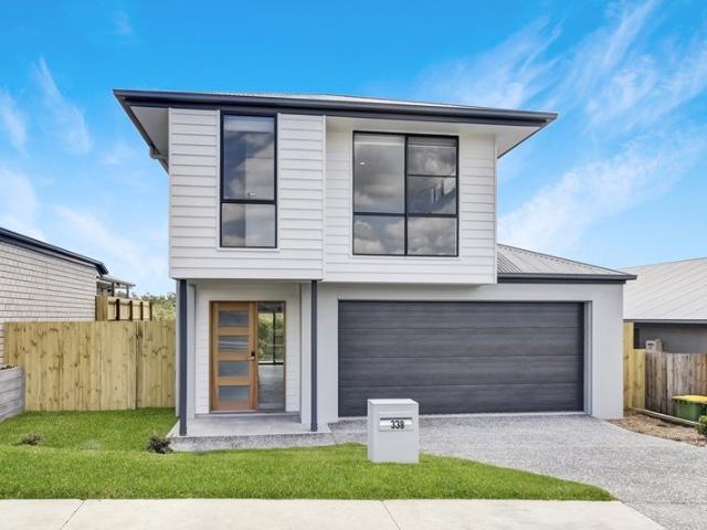 Two Storey Home with Several Living Spaces and Air Conditioning