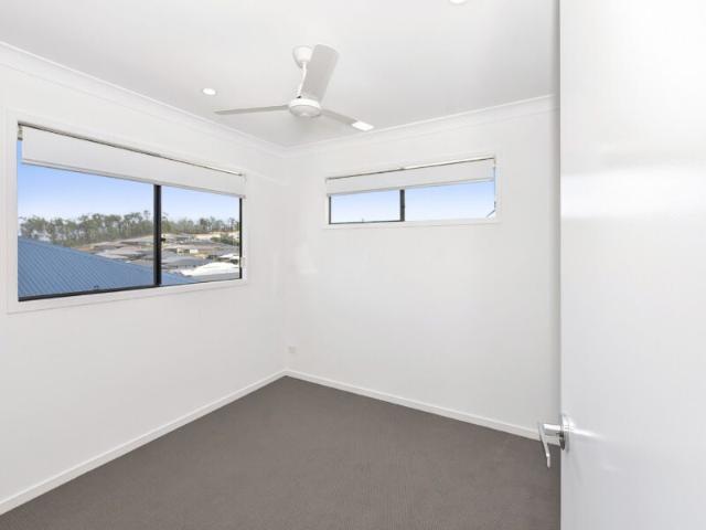 Two Storey Home with Several Living Spaces and Air Conditioning