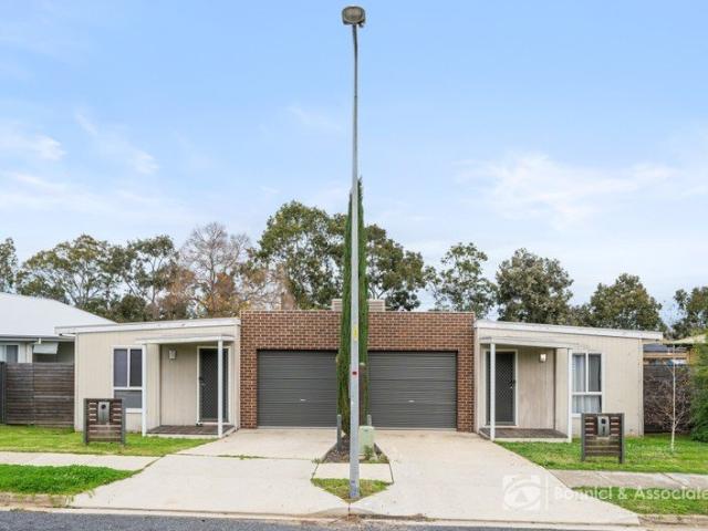 TWO TOWNHOUSES, ONE EXCEPTIONAL OPPORTUNITY