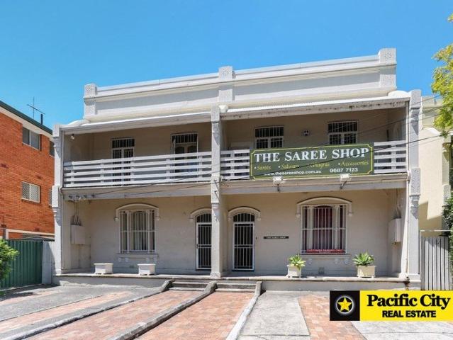 TWO TERRACE HOUSES IN TORRENS TITLES OFFER IN ONE LINE