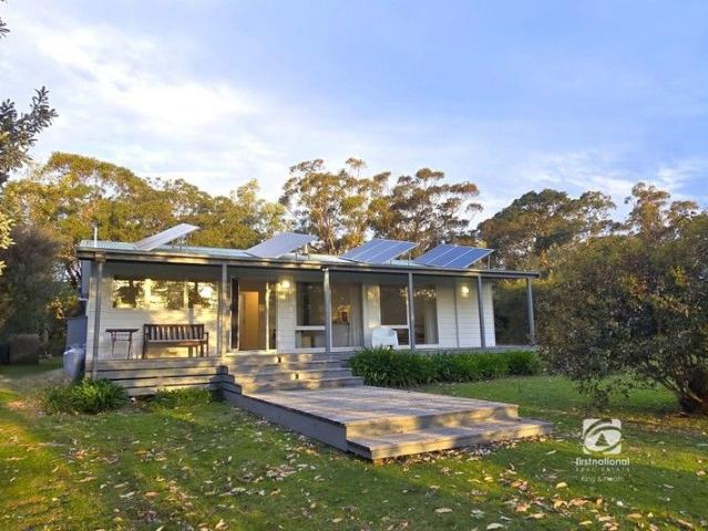 TWO TITLES HOUSE, LAND & JETTY