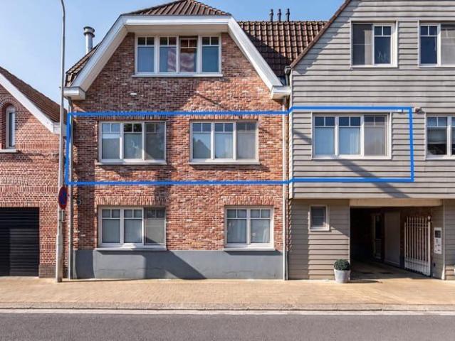 Twee slaapkamerappartement met terras en garagebox