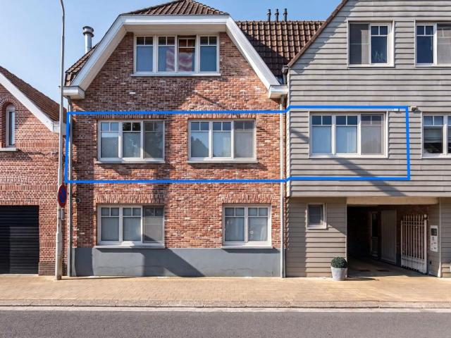 Twee slaapkamerappartement met terras en garagebox