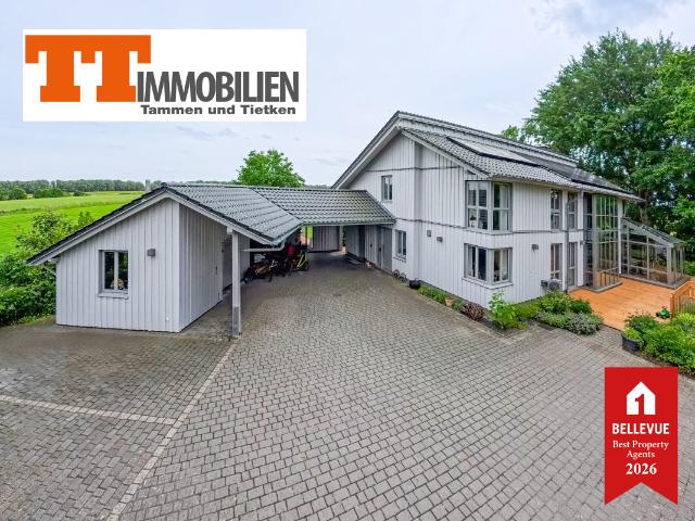 TT: Architektonische Perfektion der Extraklasse – viel Licht und Raum mit Parkgrundstück an der Nordseeküste!