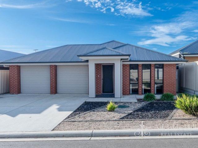 Tucked Away for Privacy and Designed for Easy, Low Maintenance Living!