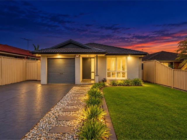 Tucked into a quiet court with space to park, play and entertain
