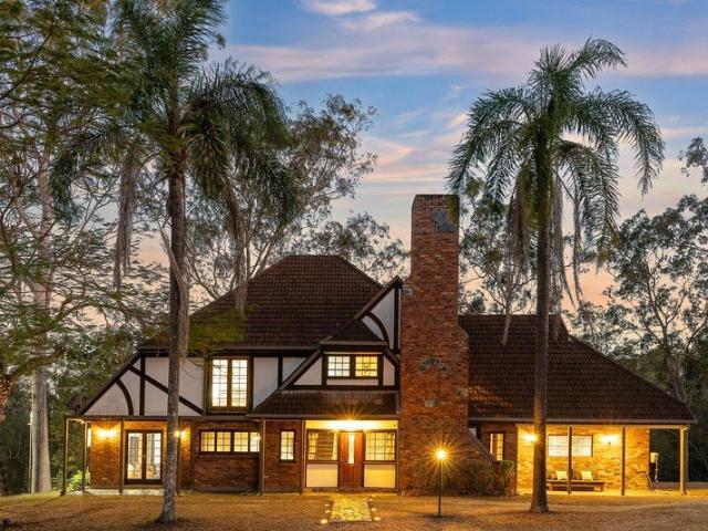 Tudor Style Retreat with Tennis Court, Paddock and Stables