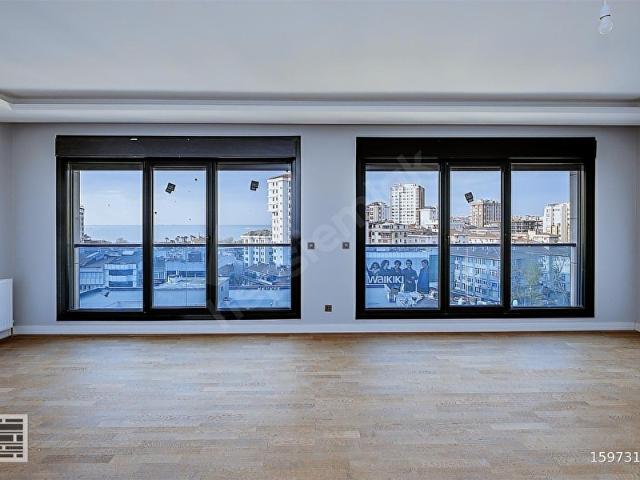 TÜLAY ÖZKÖK'TEN DENİZ MANZARALI SIFIR ARAKAT SATILIK DAİRE