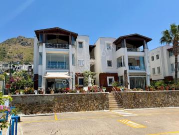 Turgutreis Yalı'da Denize Sıfır Havuzlu Harika Manzaralı Daire