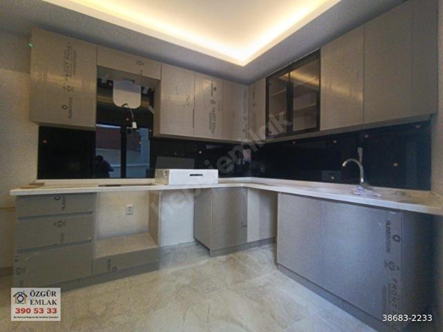 TÜRKÖZÜ MH'DE SIFIR BİNADA İSKANLI FUL YAPILI BAHÇE KAT DAİRE