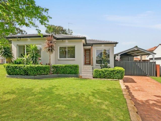 Turn Key Family Living with Stunning Renovated Kitchen & Bathrooms