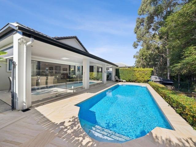 Turn Key Living with Pool, Putting Green & All the Creature Comforts