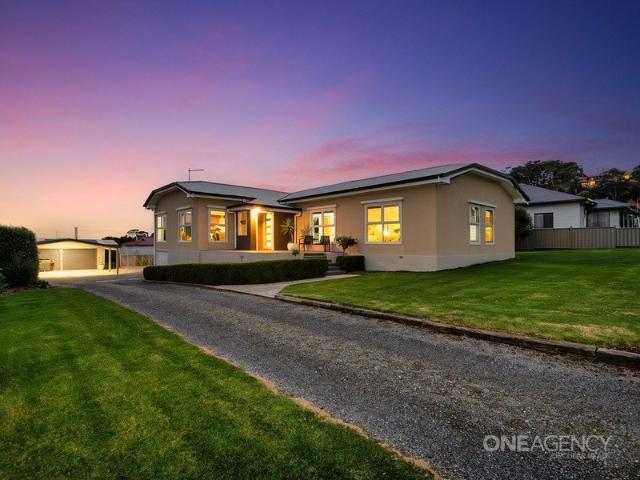 Turn Key Luxury with Stunning Duck River Views and Fully Lined Garage