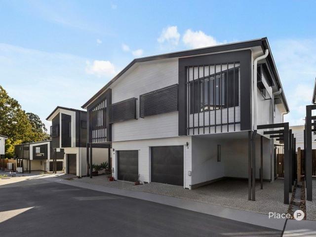 TURN KEY MODERN TOWNHOME WITH EXCEPTIONAL INVESTOR APPEAL