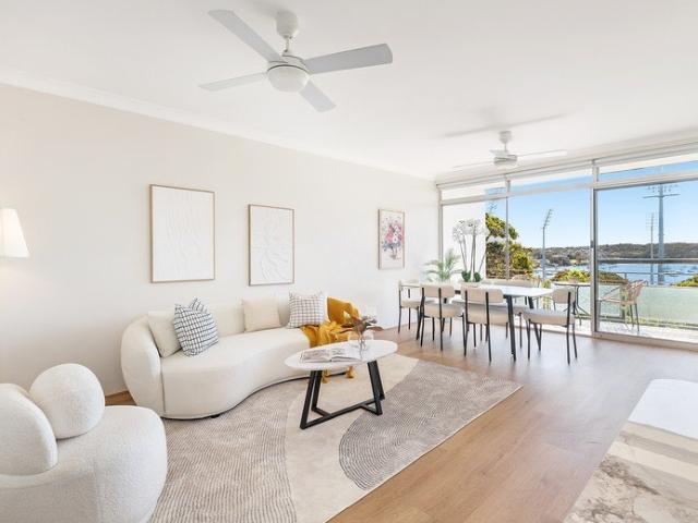 Turnkey Apartment Capturing Prime North West Water Outlook, Situated at the Rear of the Building