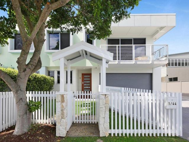 Turnkey Coastal Sophistication in a Prime Walk to Everything Setting