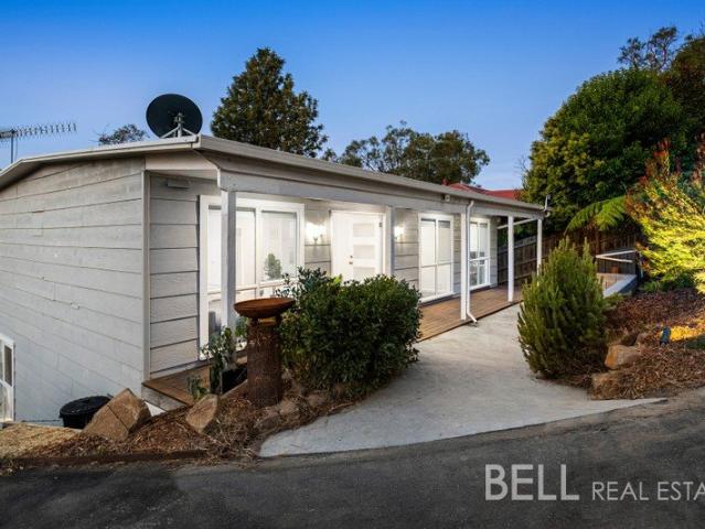 Turnkey Hills Home with Entertaining Flair and Multigeneration Appeal