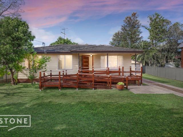 Turnkey with two living zones & a 4 bay garage