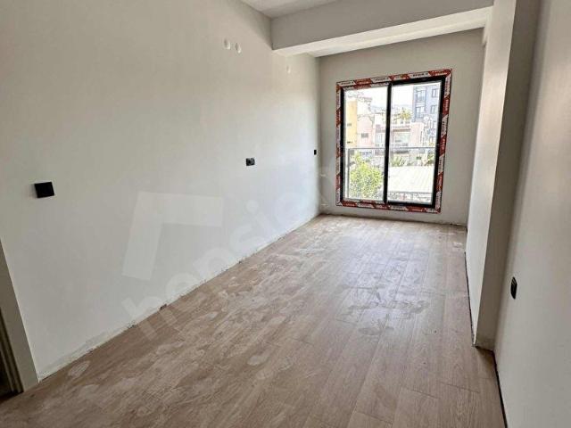 Uğur mumcu'da satılık lüx ara kat 2+1 1+1 daireler!