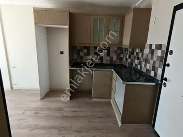 Uğur Kaya Gayrimenkul'den Sarıçam Gültepe'de 1+1 Satılık Daire